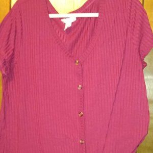 Women's top with tie at the bottom of shirt,